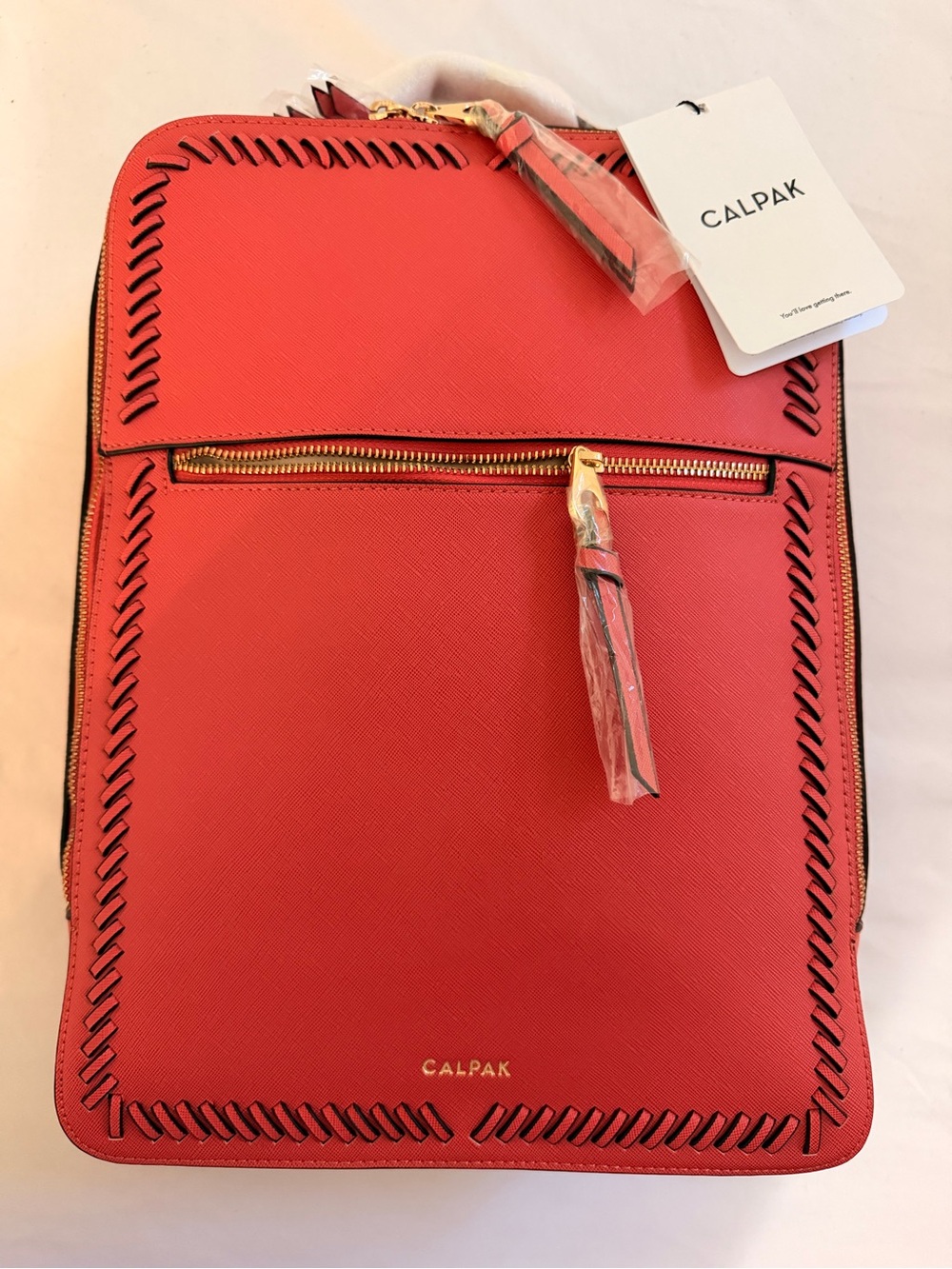 Calpak Kaya 15" Laptop Backpack in vibrant red